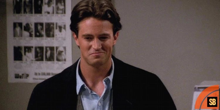Chandler Bing played by Matthew Perry in Friends cracking a joke